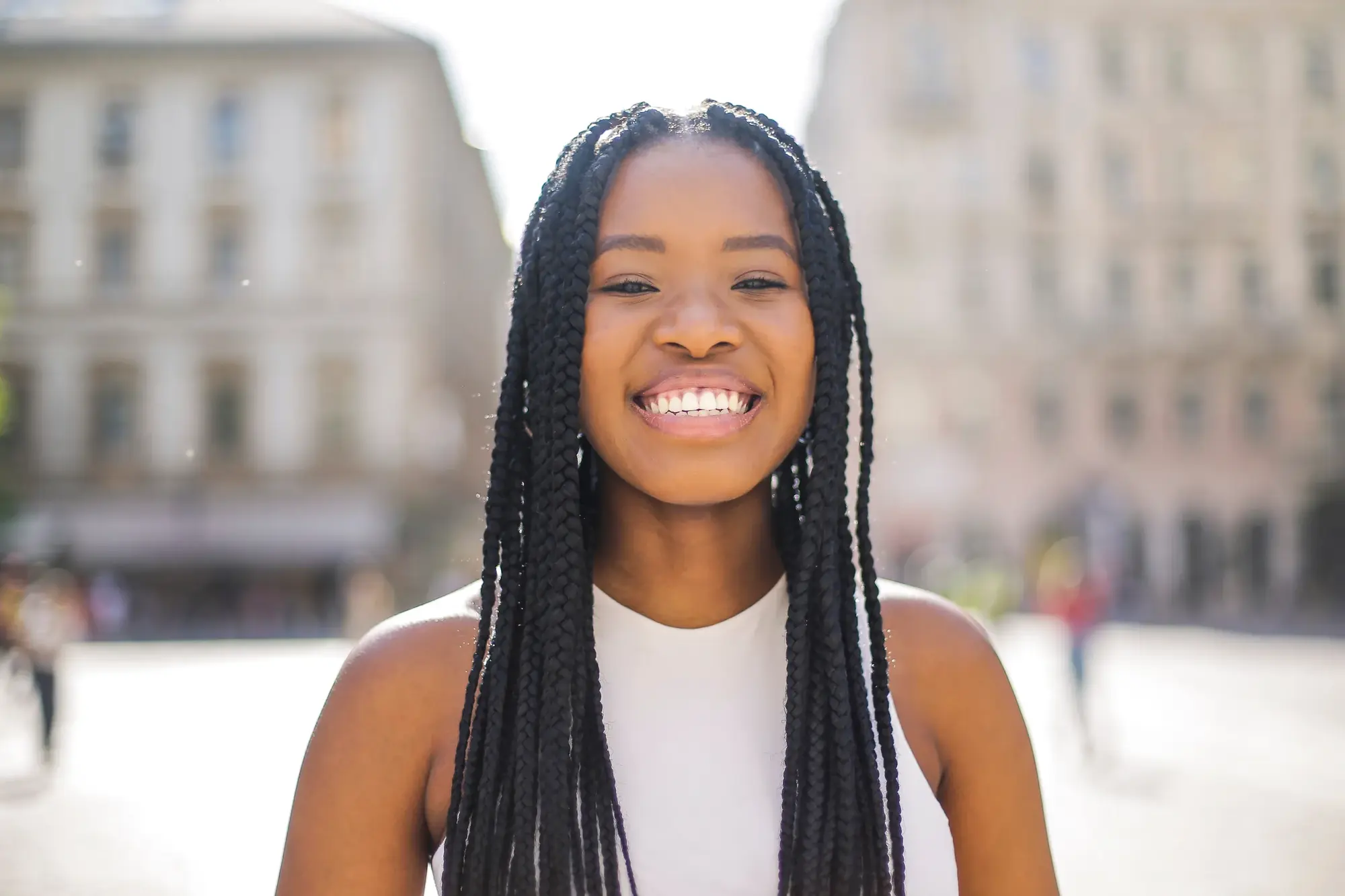 Patient smiling for gingivitis prevention education